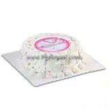 Red ribbon greetings cake